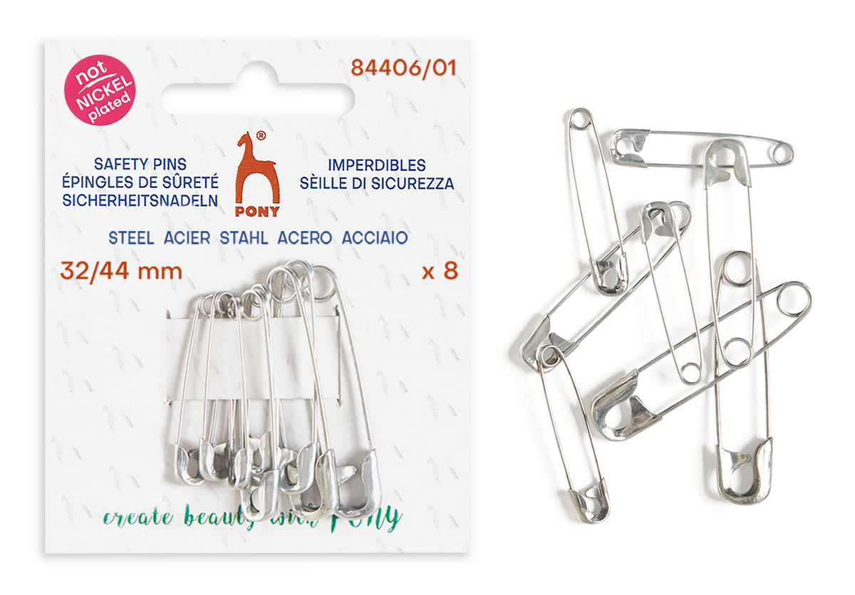 Pack of eight silver safety pins in a white retail blister pack, with four loose pins displayed to the right on a white background.