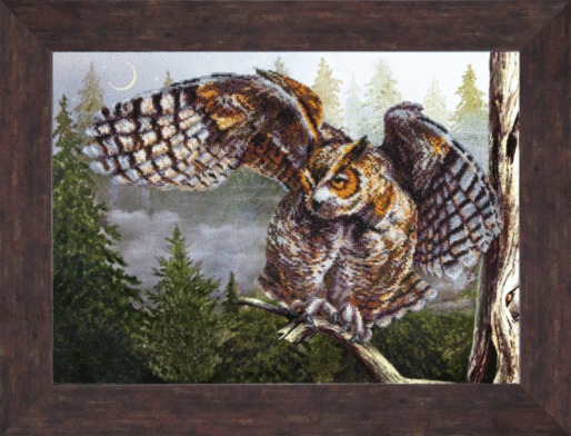 Completed bead embroidery of a wise bird perched on a branch from the Charivna Mit kit.