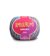 A ball of Amigurumi Circulo yarn by Amigurumi, featuring a vibrant multicolor striped pattern with a prominent pink and purple label.