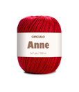 Red ball of yarn with a white label on a white background