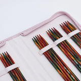 KnitPro Symfonie 2 double pointed needle set, 20 cm - Set of colorful knitting needles in a pink case on a white background