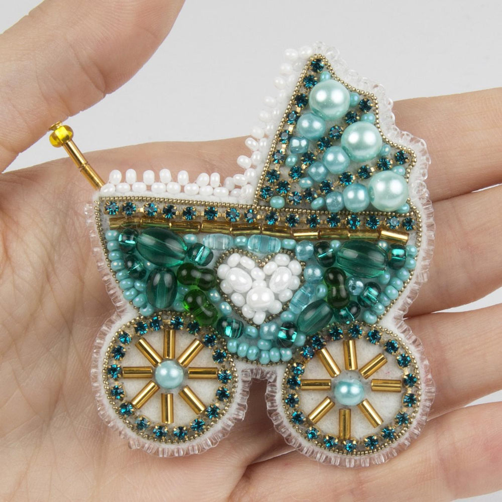 Beadwork kit for crafting a stroller brooch.